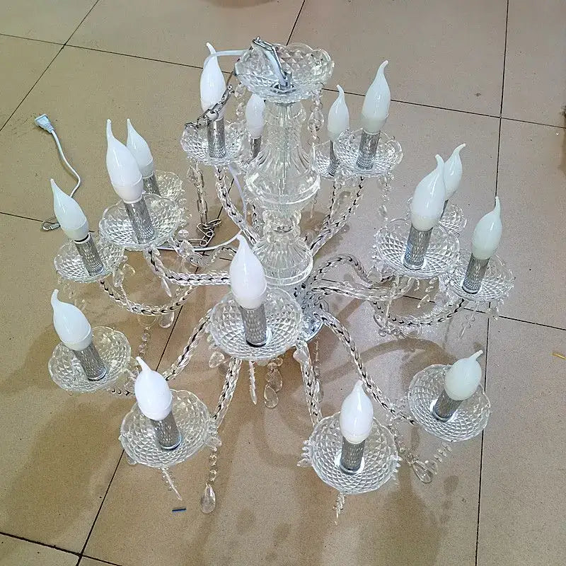 European style clear crystal pendant light with white candle bulbs and silver accents perfect for wedding hall decorbites crystal light road