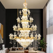 Grand multi tier gold crystal chandelier with clear droplets and prisms for elegant crystal living room decor