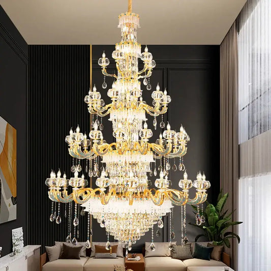 Grand multi tier gold crystal chandelier with clear droplets and prisms for elegant crystal living room decor