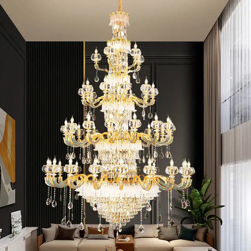 Grand multi tier gold crystal chandelier with clear droplets and prisms for elegant crystal living room decor