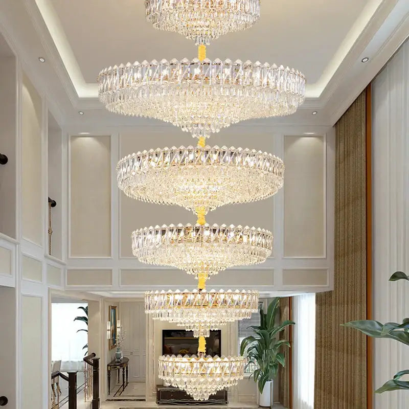 Modern gold multi tiered crystal living room chandelier with cascading clear faceted crystals by decorbites crystal living