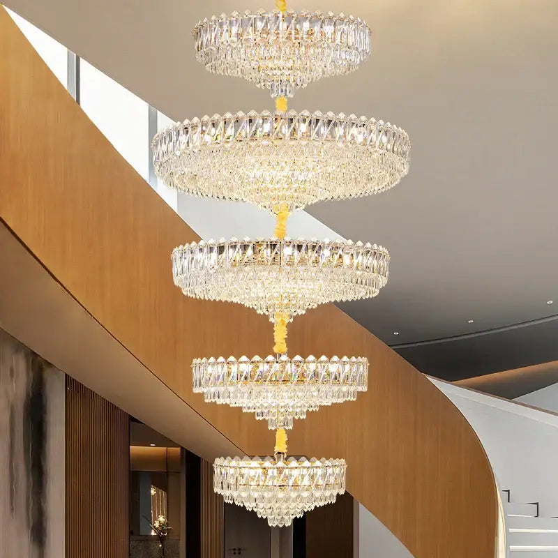 Modern gold multi tiered crystal living room chandelier with clear faceted glass elements by decorbites crystal living