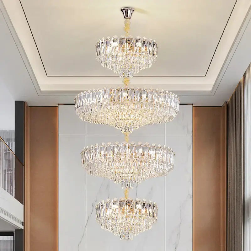 Modern gold multi tiered crystal living room chandelier with polished chrome finish and cascading faceted crystals decorbites crystal living