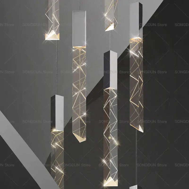 Modern geometric silver and gold crystal loft chandelier with sleek metallic frames and warm LED decorbites crystal lighting