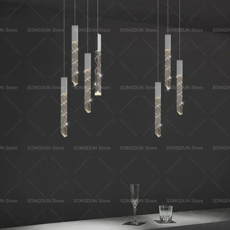 Modern geometric silver and gold crystal loft chandelier with minimalist transparent acrylic pendant lights by decorbites crystal loft