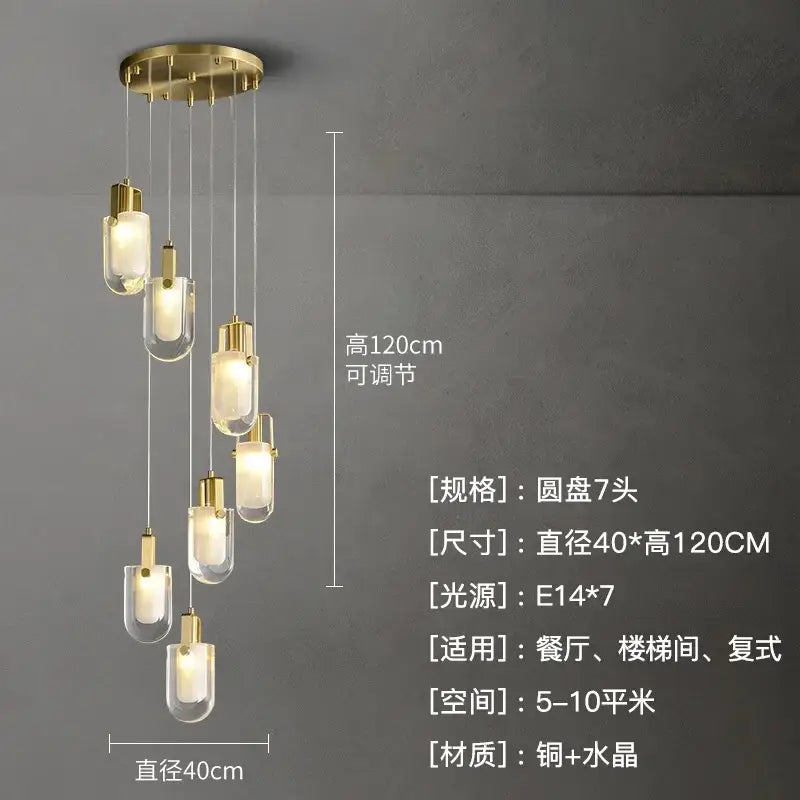 Modern gold cascading crystal loft chandelier with seven clear glass pendants and copper base for living room