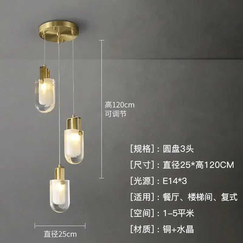 Modern gold cascading crystal loft chandelier with three cylindrical glass shades and brass ceiling mount for living room