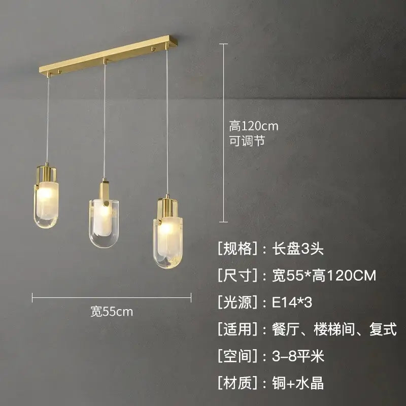 Modern gold cascading crystal loft chandelier with three clear glass shades on a sleek horizontal bar for living room