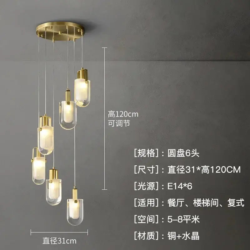 Modern gold cascading crystal loft chandelier featuring six clear glass pendant lights on a circular copper base