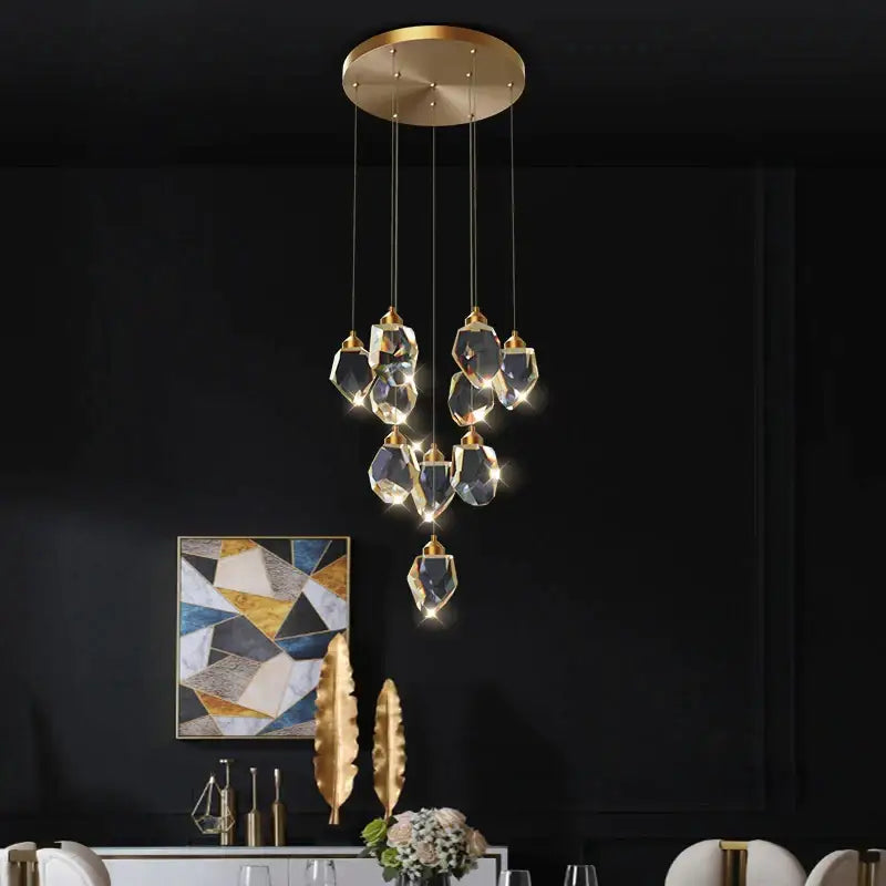 Gold-toned modern crystal loft chandelier with faceted crystal pendants for large stairwell pendant lighting decorbites crystal loft