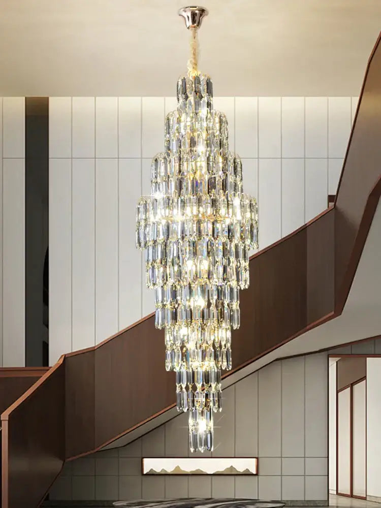 Crystal spiral tiered loft pendant light with cascading clear glass prisms and polished chrome mount for staircase and living room