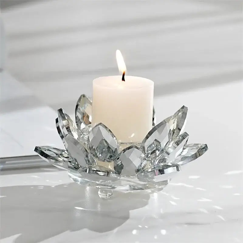 Clear crystal lotus candle holder with faceted petals and central base for dining room aromatherapy use
