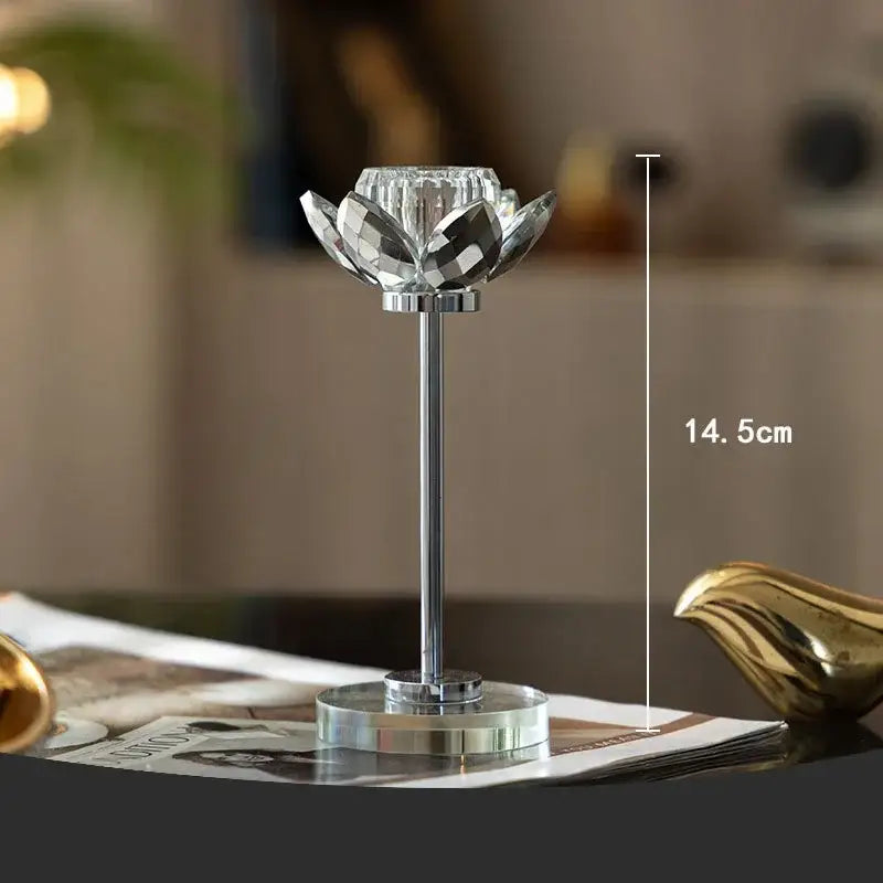 Elegant gold and crystal lotus candle holder with sleek chrome stem and base for dining room decor