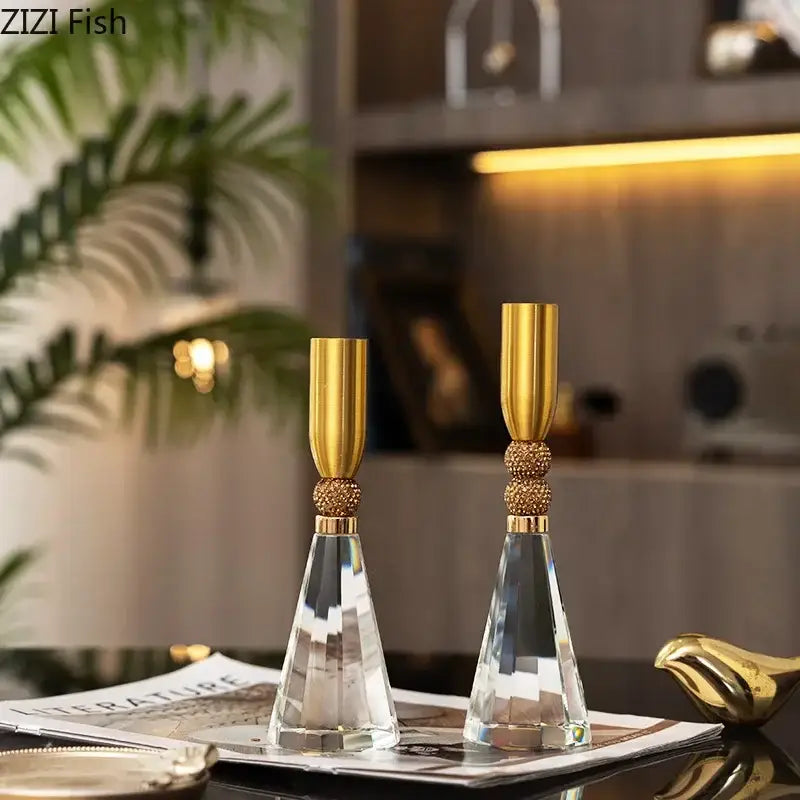 Two elegant gold and crystal lotus candle holders with beaded accents for dining room decor