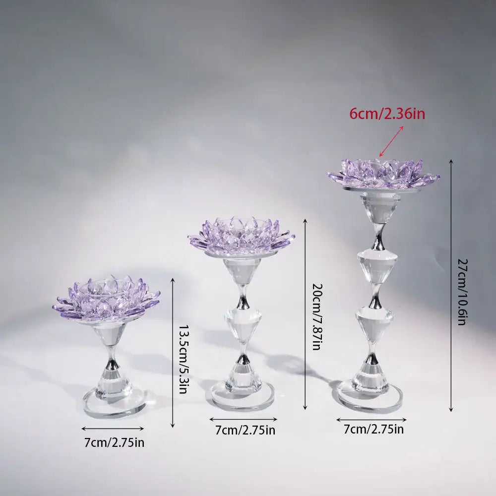 Three clear glass lotus candle holders with purple lotus flower tops and tiered design for dining room decor