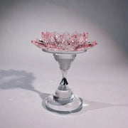 Delicate pink and clear crystal lotus candle holder with glass stem and base for elegant dining room decor