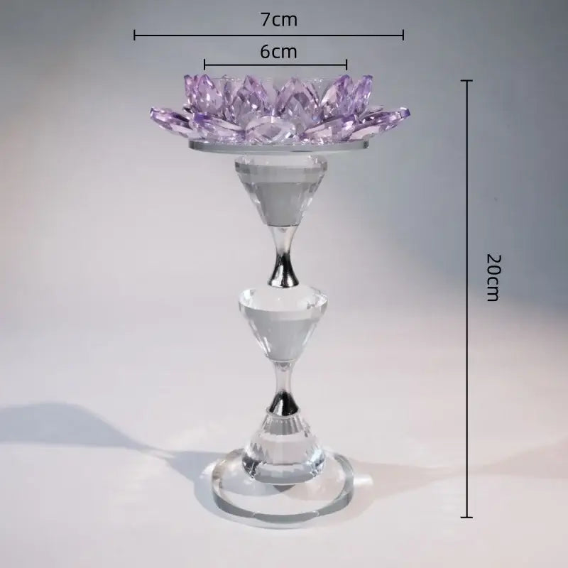 Purple crystal lotus candle holder on a clear glass pedestal with silver accents for elegant dining room decor