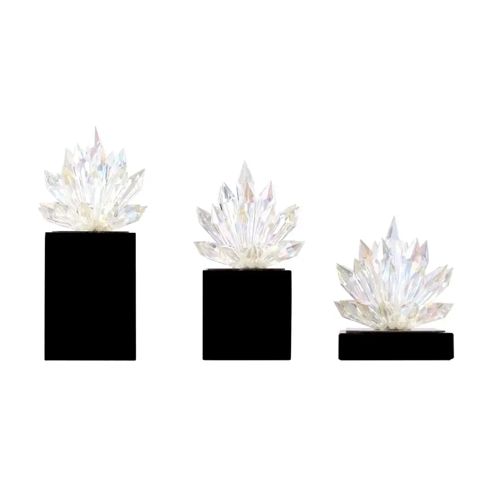 Three clear faceted crystal cactus sculptures on black bases as translucent crystal lotus tabletop decoration decorbites crystal lotus