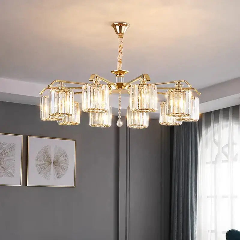 Modern gold crystal lustre chandelier with clear faceted glass cylinders and central crystal pendant for luxury dining room decorbites crystal lustre