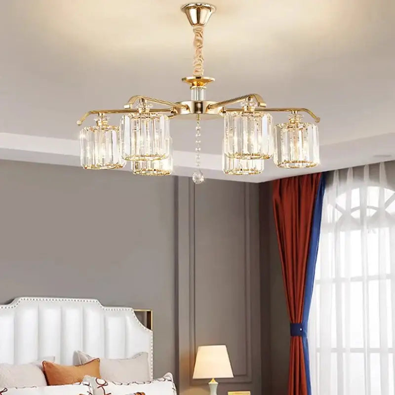 Modern gold crystal lustre chandelier with five faceted glass shades and dangling crystal accent for luxury dining room decorbites crystal lustre