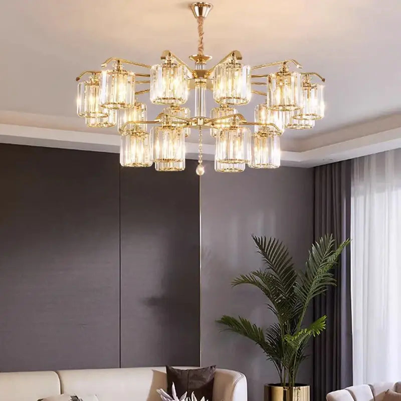 Modern gold crystal lustre chandelier with clear glass cylinder shades and central pendant bead for luxury dining room decorbites crystal lustre