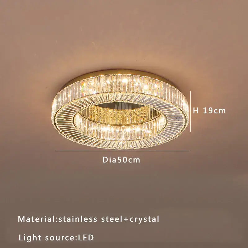 Modern gold led ceiling lamp with two concentric crystal rings and gold stainless steel frame for dining room decorbites crystal luxe