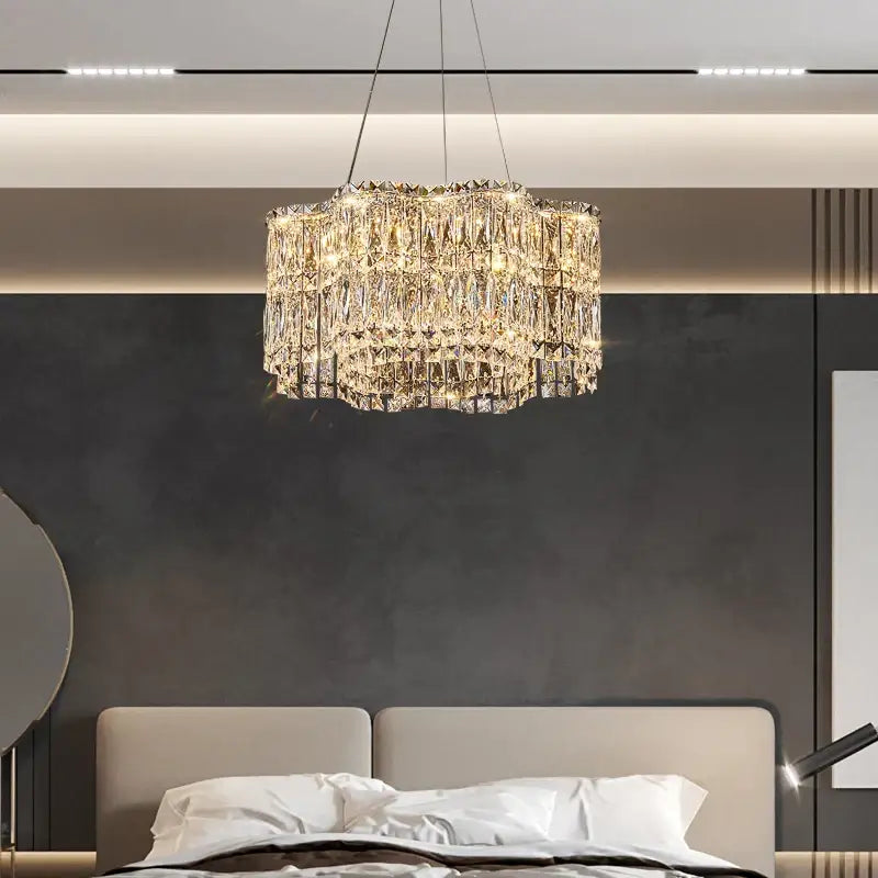 A decorbites crystal luxe multi-tiered gold chandelier with faceted glass and warm golden glow for living room lighting