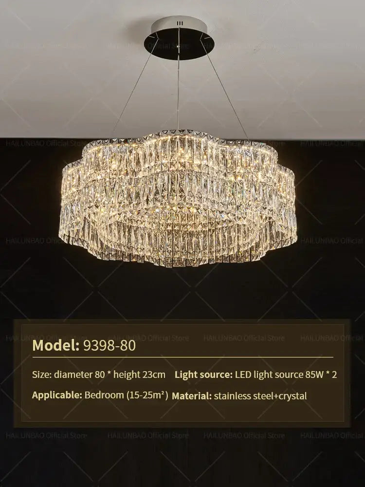A modern decorbites crystal luxe multi-tiered gold chandelier with cascading crystal strands and stainless steel frame