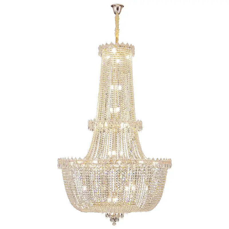 A modern European crystal luxe chandelier with a gold-toned frame and cascading clear faceted crystals for living room decor