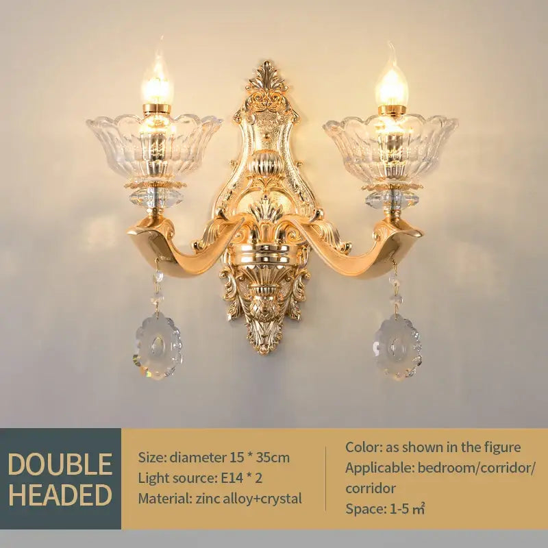 European gold crystal luxe pendant lamp featuring ornate double-headed wall sconce with crystal glass shades and dangling crystals