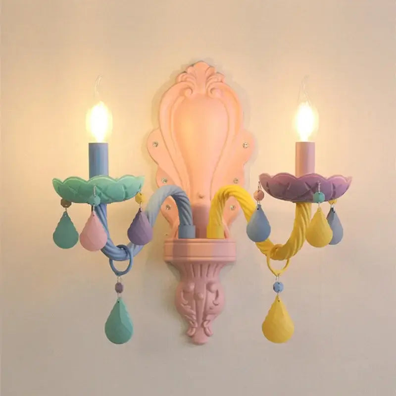 Pastel rainbow crystal luxury candle chandelier wall sconce with sculpted pink base and colorful twisted arms for decorbites crystal luxury decor