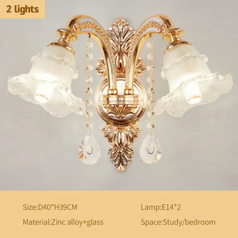 Modern gold-toned ornate wall sconce with frosted flower-shaped shades and crystal teardrops for decorbites crystal luxury decor