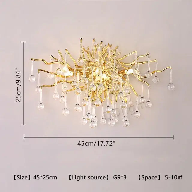 Modern gold crystal luxury ceiling chandelier featuring a gold-toned branch sconce with dangling crystal droplets decorbites crystal luxury