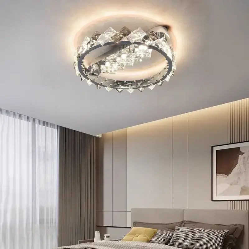 Modern chrome crystal luxury ceiling light with clear faceted crystals and warm LED glow for elegant living room decorbites crystal luxury