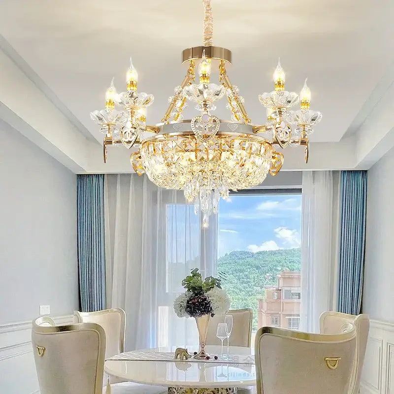 A decorbites crystal luxury gold chandelier with intricate crystal droplets and candle-style bulbs for living room