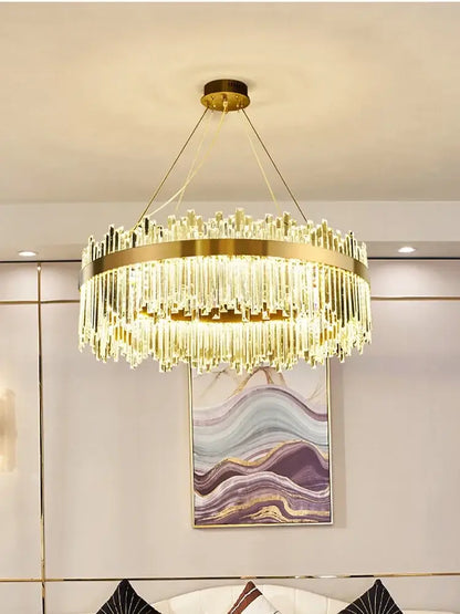 Gold-toned DecorBites crystal pendant chandelier with cascading clear prisms for luxury modest crystal home decor