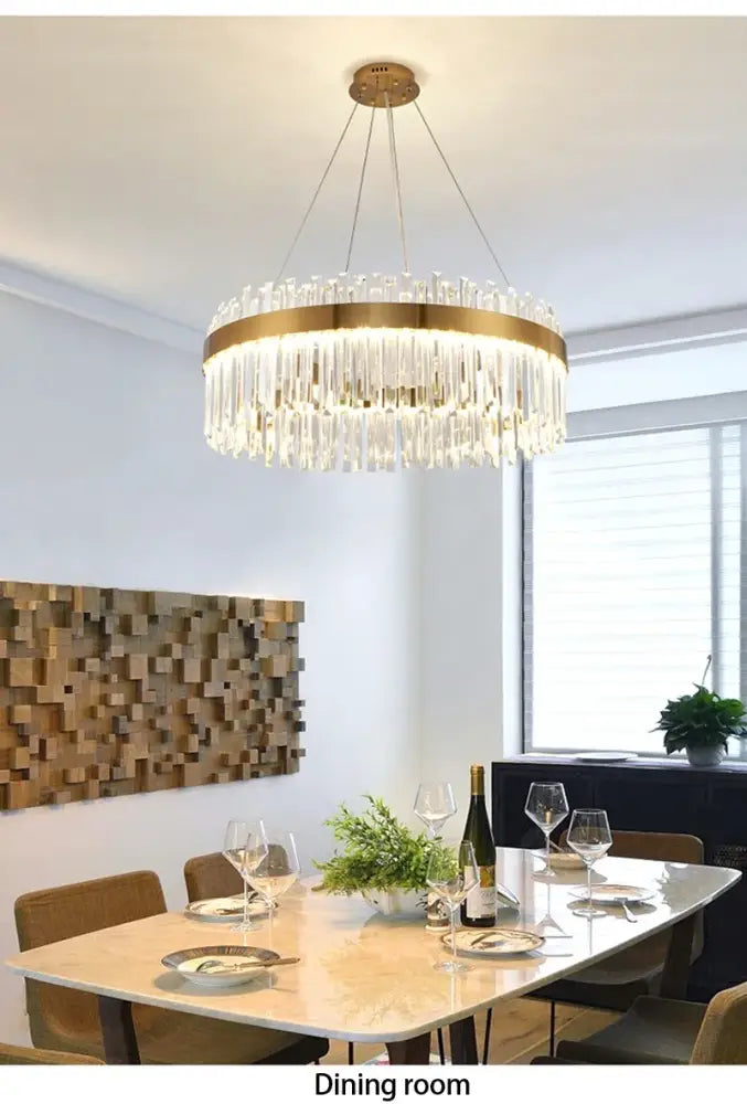 DecorBites™ Crystal pendant chandelier with a gold-toned frame and cascading clear prisms for luxury modest crystal home decor