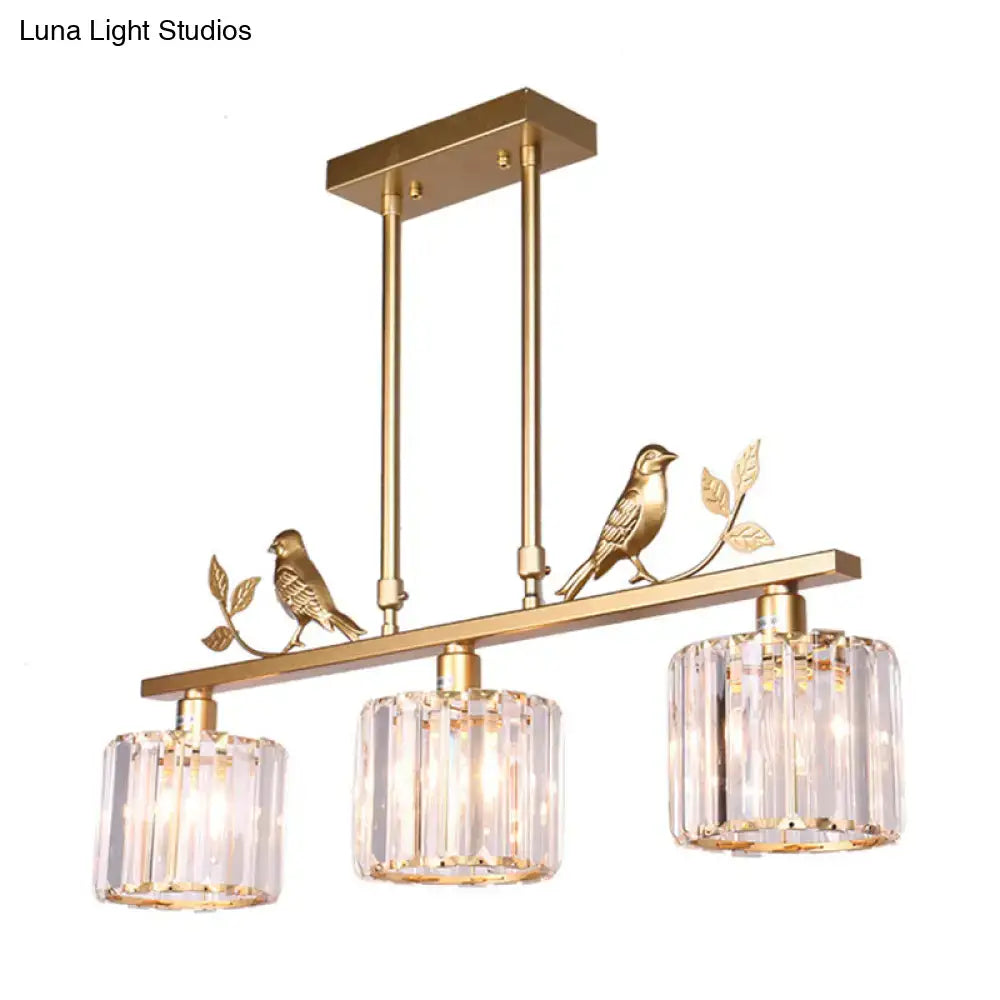 Gold-toned DecorBites™ crystal prism light fixture with three cylinder shades and bird leaf decor for 220v-240v 110v-120v use