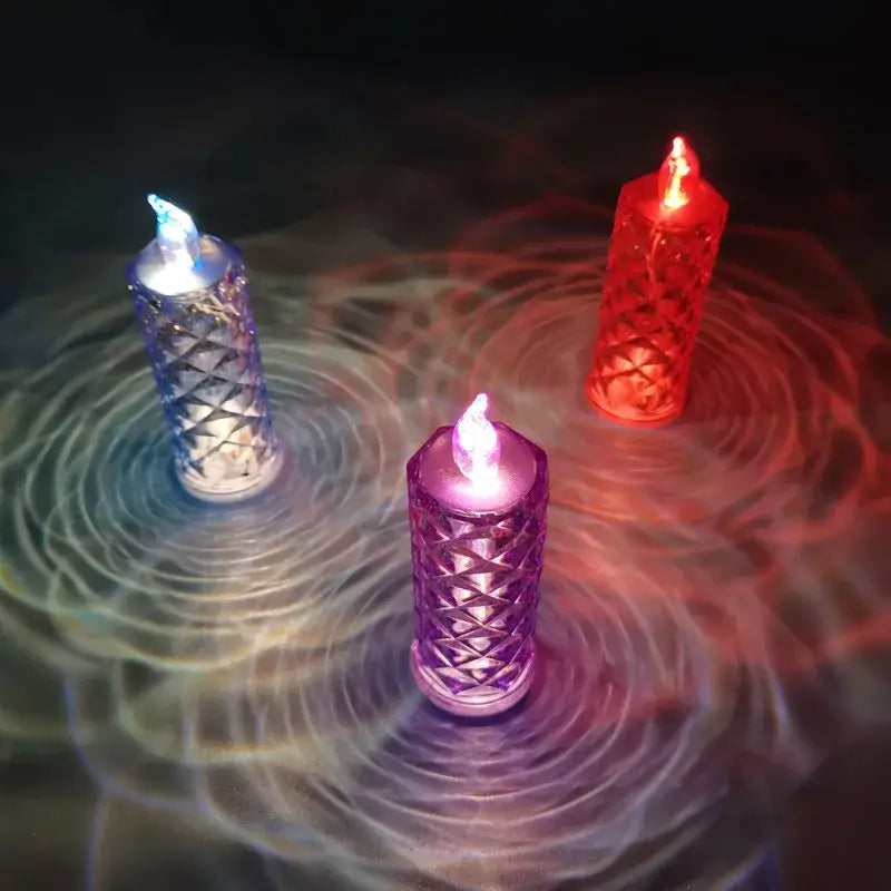 Three decorbites crystal rose red led candles with faceted dioptric design glowing blue red and purple night light