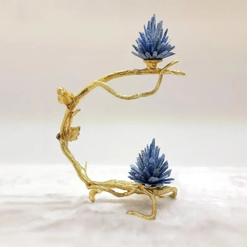 Golden bird decorbites crystal stone golden branch sculpture holding two vibrant blue crystal clusters for living room decor
