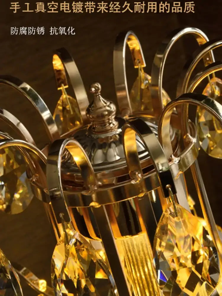 Golden crystal chandelier with polished brass frame and amber crystals in decorbites crystal table lamp bedroom light