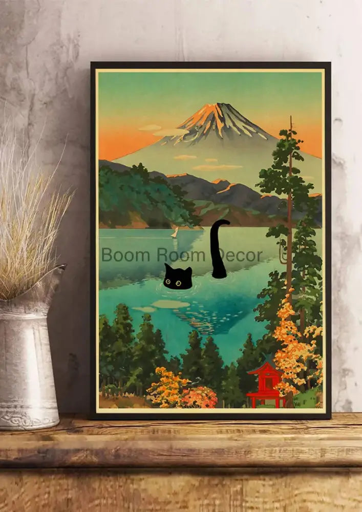 A framed vintage-style kraft paper poster print of cute digital cats with a mountain and turquoise water landscape