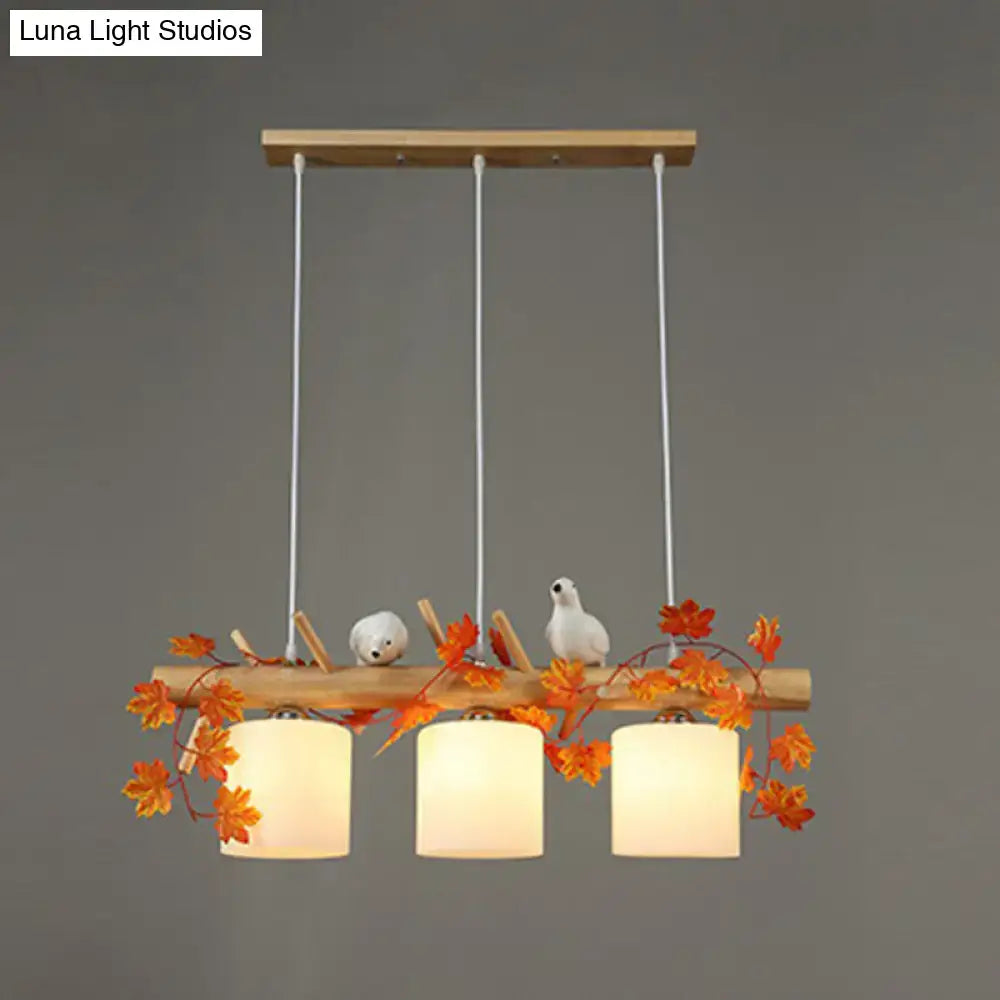 Decorbites™ cylindrical milk glass pendant light with warm shades and resin bird deco for country style restaurants
