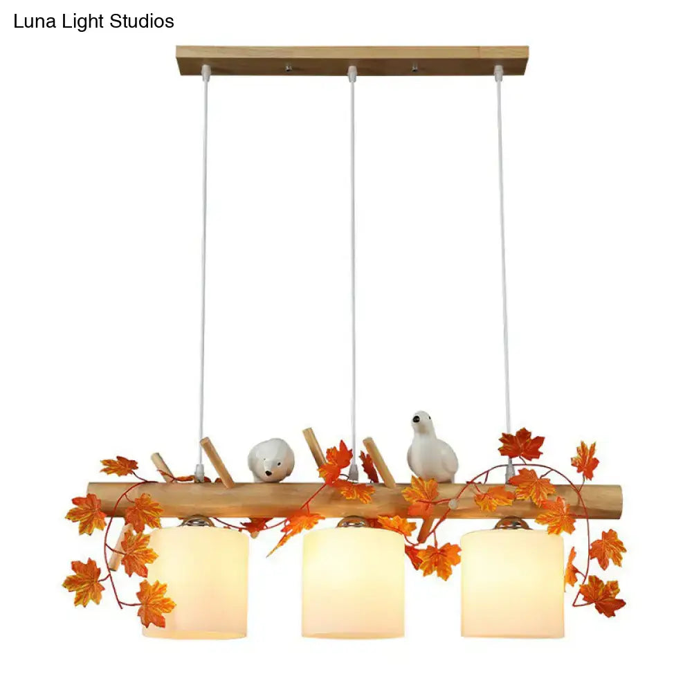 Decorbites™ cylindrical milk glass pendant light with warm glass shades and resin bird deco for country style restaurants