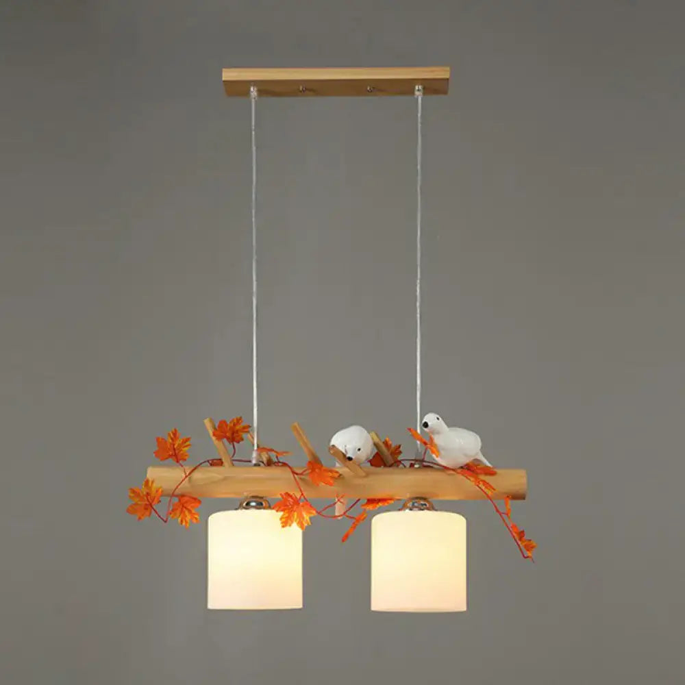 Decorbites™ cylindrical milk glass pendant light with warm shades and resin bird deco for country style restaurants
