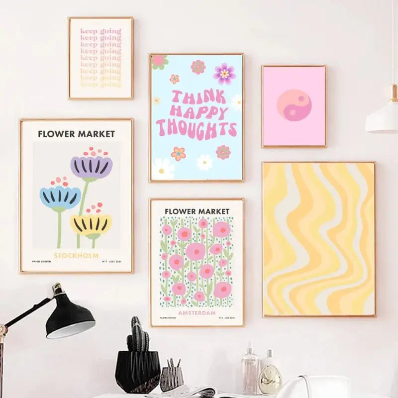 Pastel-colored framed wall art prints featuring danish pastel smiley flower and motivational floral designs by decorbites