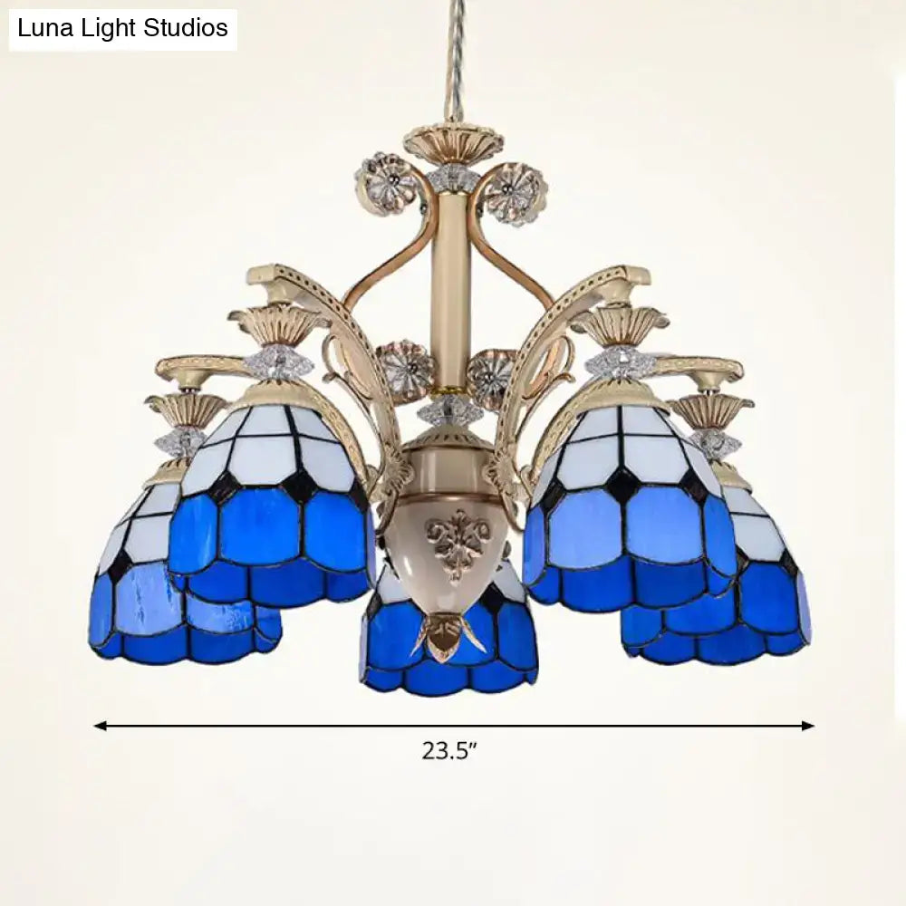 DecorBites dazzling Baroque chandelier light fixture in blue and white stained glass with gold-toned metal accents