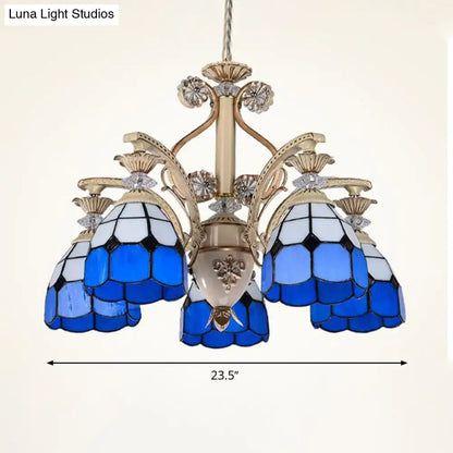 DecorBites dazzling Baroque chandelier light fixture in blue and white stained glass with gold-toned metal accents