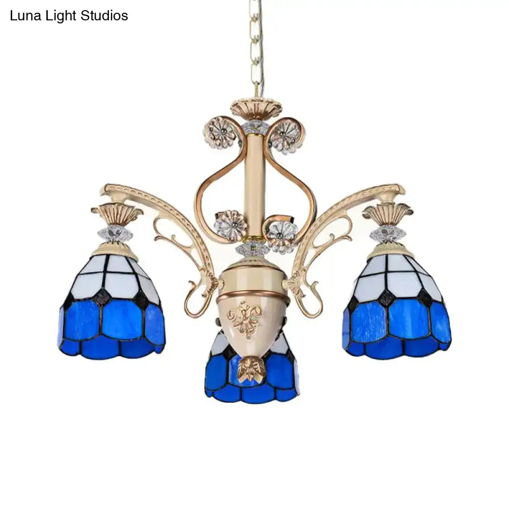 DecorBites dazzling Baroque chandelier light fixture in blue and white stained glass with gold-toned metal accents