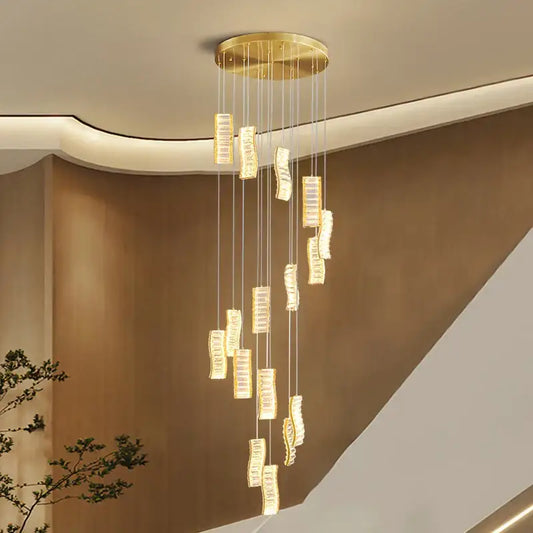 Golden circular ceiling fixture with cascading rectangular crystal pendants in decorbites deluxe crystal spiral slinglights pendant
